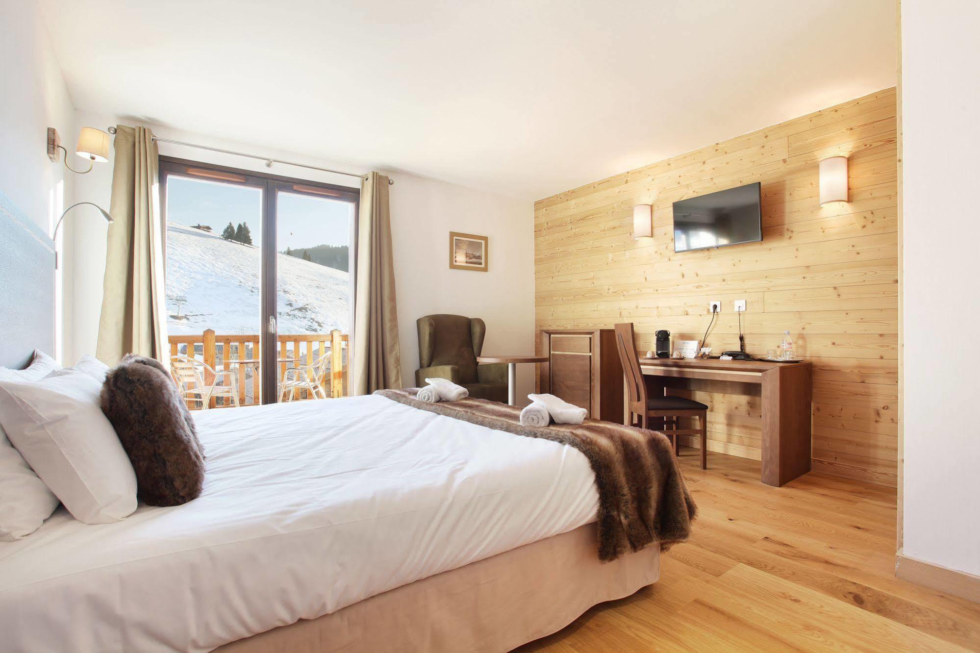 Hotel Prestige Odalys Le Chamois La Clusaz Exterior foto